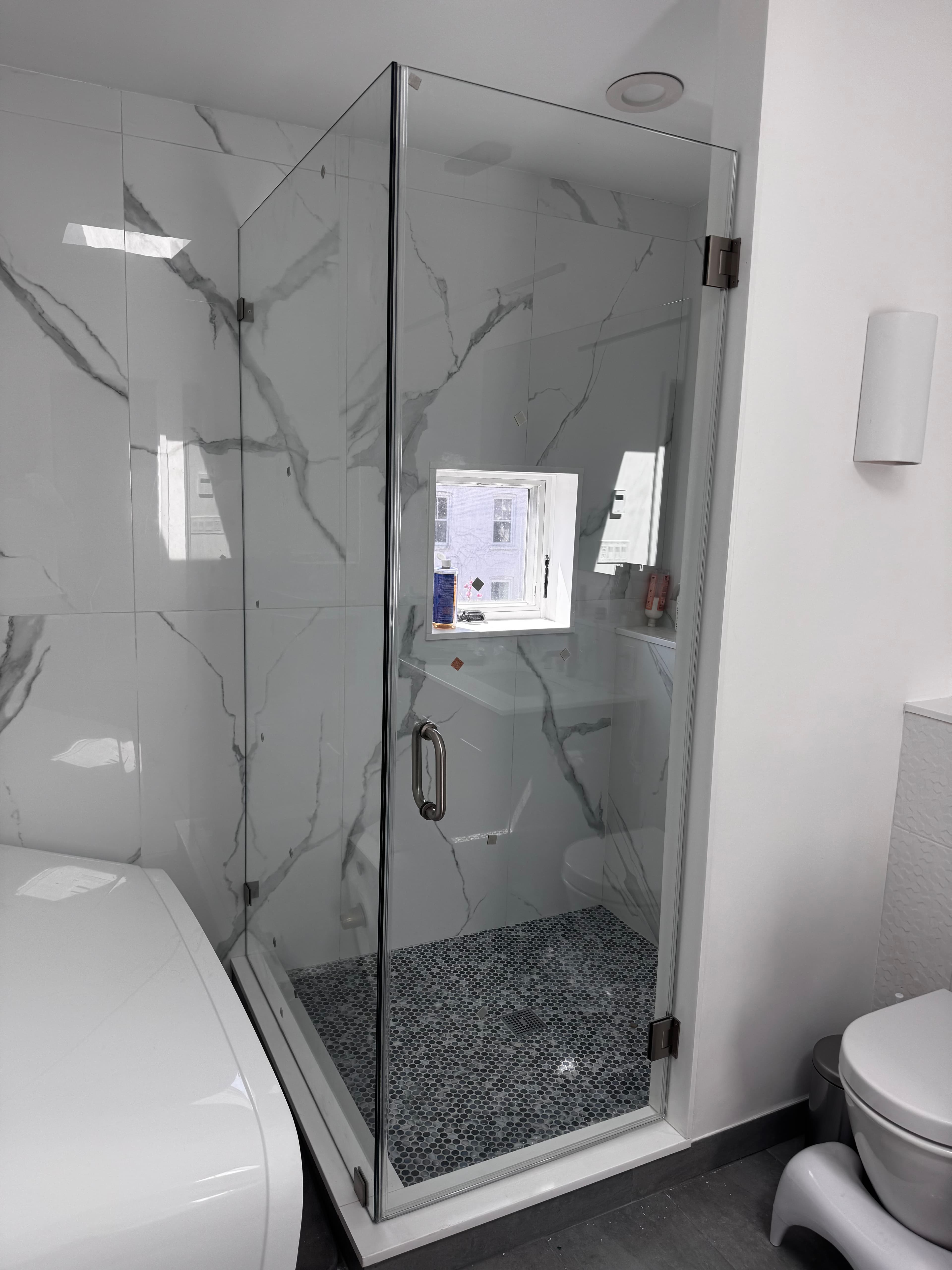 Corner Swing Door shower door installation in Monsey